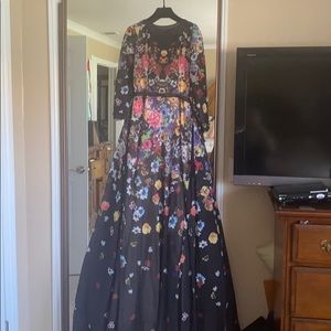 Jovani floral black over skirt size 8 but fits 12
